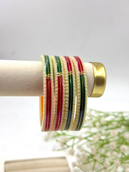MULTICOLOR SWASTIK GOLD TAAR BANGLES